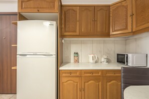 Fridge, microwave, oven, coffee/tea maker - Athenian Apartment is an authentic Greek apartment 1 min from the metro.  (Athina)