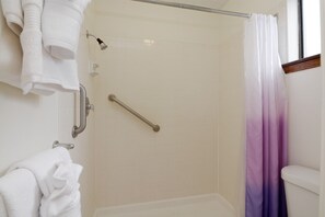 Combined shower/tub, hair dryer, towels, soap