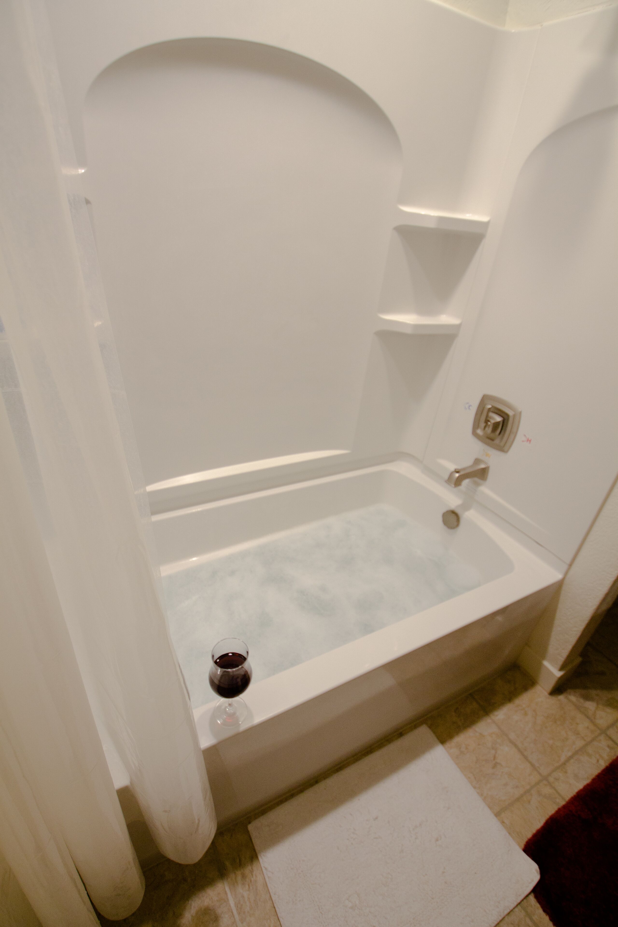 Combined shower/bathtub, hair dryer, towels, soap