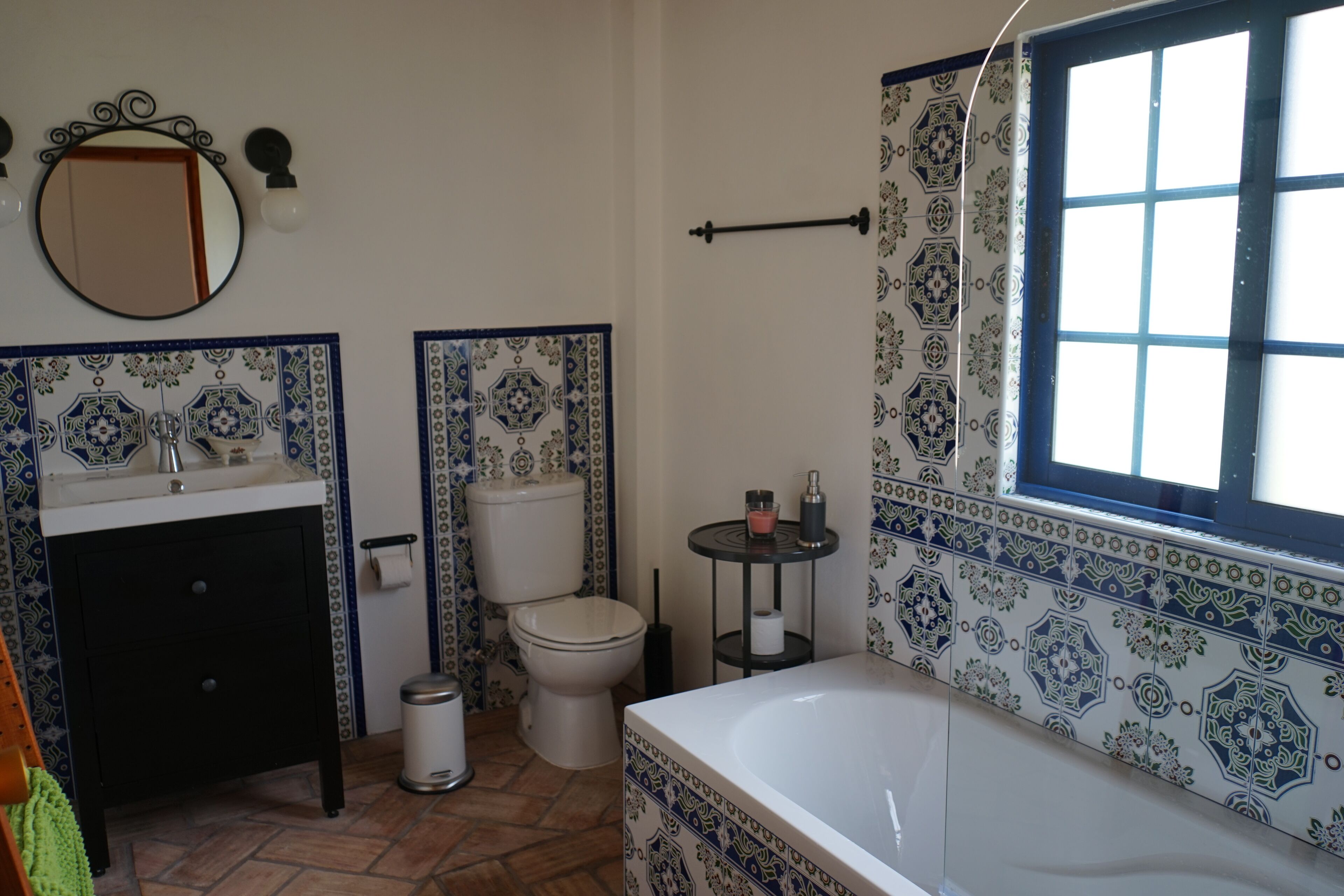 Bathtub, hair dryer, towels, soap