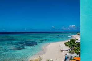 On the beach, sun loungers, beach towels