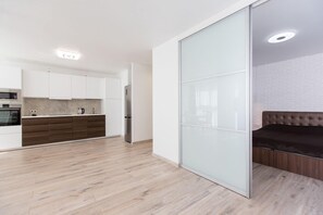 Standaard appartement (Penthouse) | Verduisterende gordijnen, geluiddichte muren