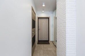 Standaard appartement (Penthouse) | Verduisterende gordijnen, geluiddichte muren