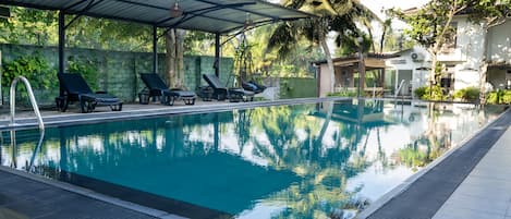 Outdoor pool, sun loungers