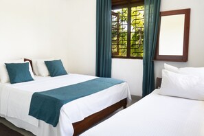 Standard Triple Room, 1 Bedroom, Non Smoking, Garden View | Blackout drapes, iron/ironing board, bed sheets