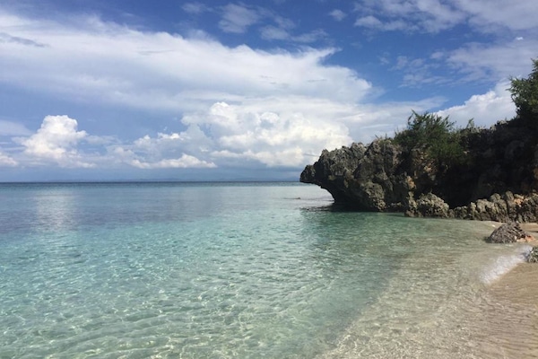 On the beach, white sand, free beach cabanas, sun loungers