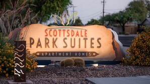 A sign for Scottsdale Park Suites, indicating it is an apartment home. - 147 Fully Furnished 1BR Suite-Pet Friendly! (Scottsdale)
