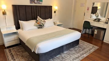 Habitación Deluxe, 1 cama Queen size, para no fumadores | Caja de seguridad en la habitación, wifi gratis y ropa de cama