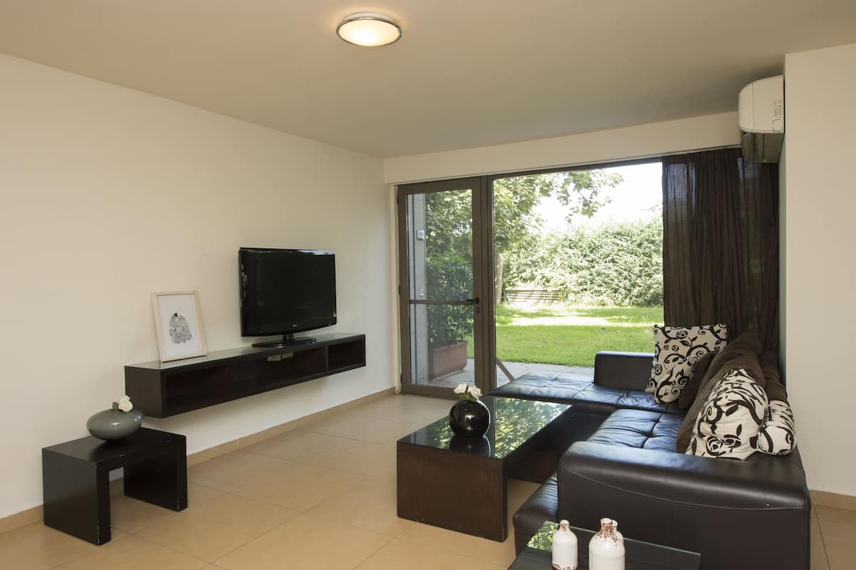 Economy Duplex, 2 Bedrooms | Living area | 40-inch LED TV with satellite channels, TV