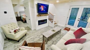 Smart TV, fireplace, DVD player, books