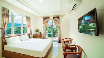 Phòng đơn Deluxe, 1 giường cỡ queen, hút thuốc, quang cảnh thành phố | Minibar, két bảo mật tại phòng, bàn