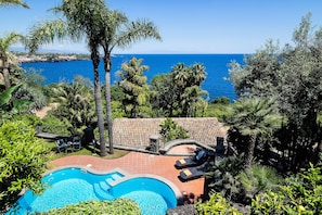 Seasonal outdoor pool, pool umbrellas, pool loungers