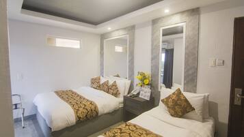Habitación superior | Escritorio, wifi gratis, ropa de cama