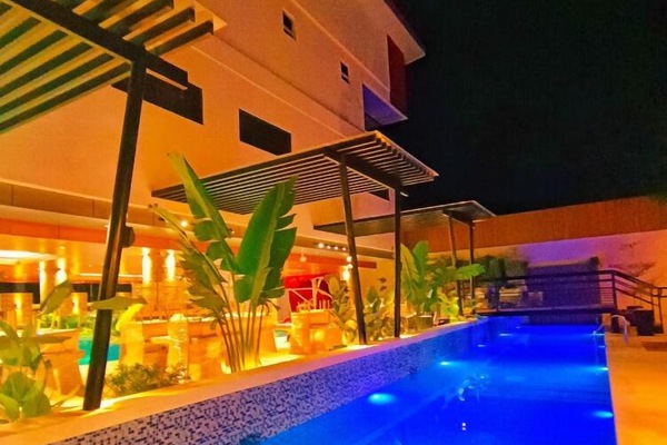 Outdoor pool, open 7:00 AM to 11:00 PM, pool umbrellas