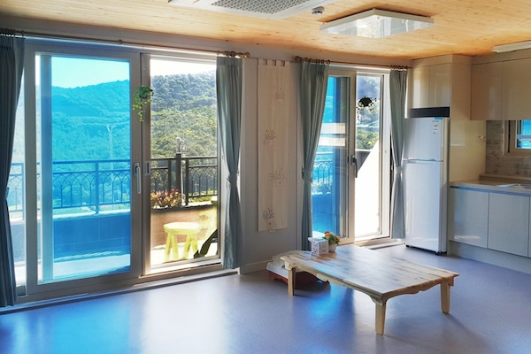 Room (A) | Living area | Flat-screen TV