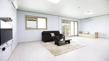 Family Room | Living area | Flat-screen TV, heated floors