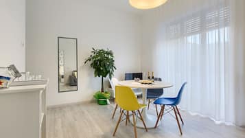 Suite, Balcony | Living area | Flat-screen TV