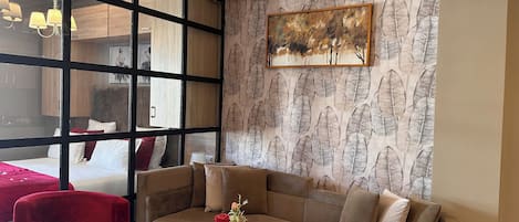 Executive Suite, 1 King Bed, Accessible, Kitchen | Down duvets, individually decorated, laptop workspace, blackout curtains