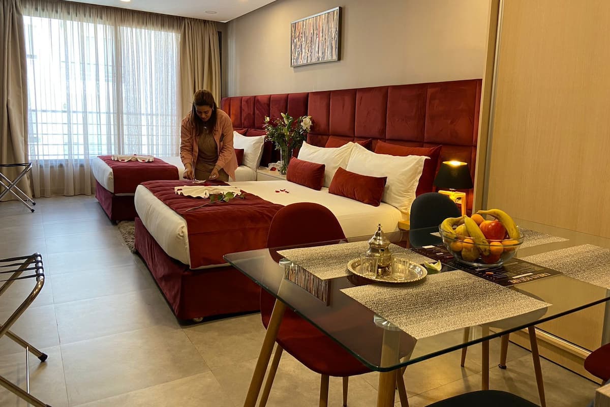Family Room, 1 Bedroom | Down comforters, individually decorated, laptop workspace