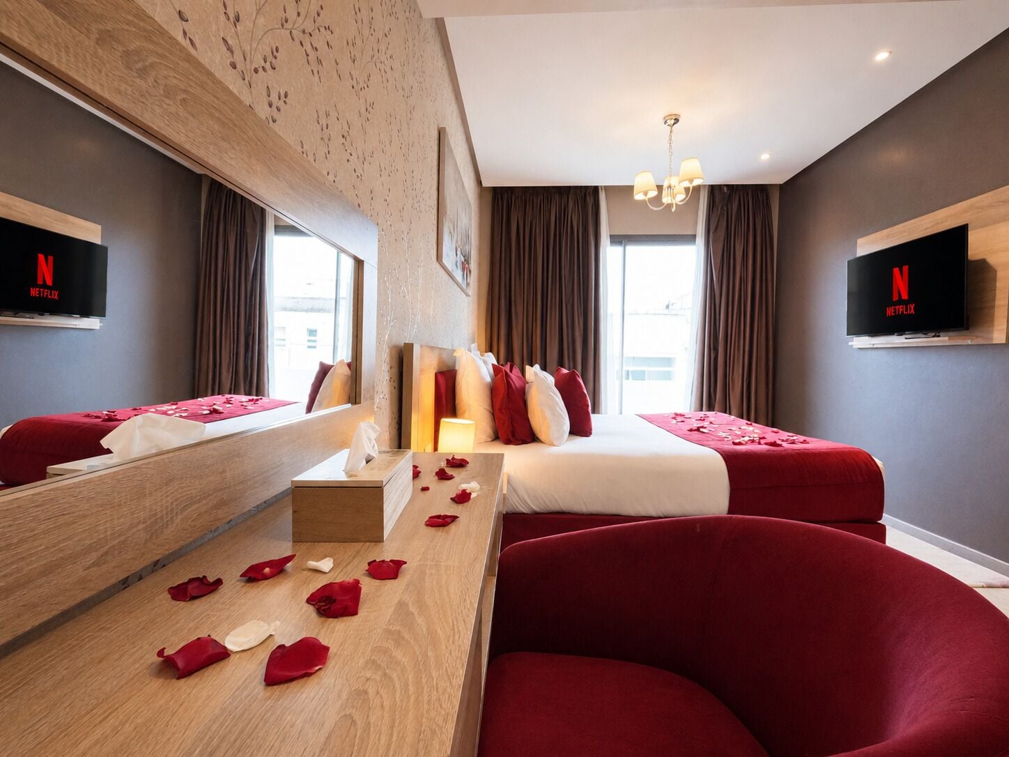 Deluxe Suite, 1 Bedroom, Balcony | Down comforters, individually decorated, laptop workspace