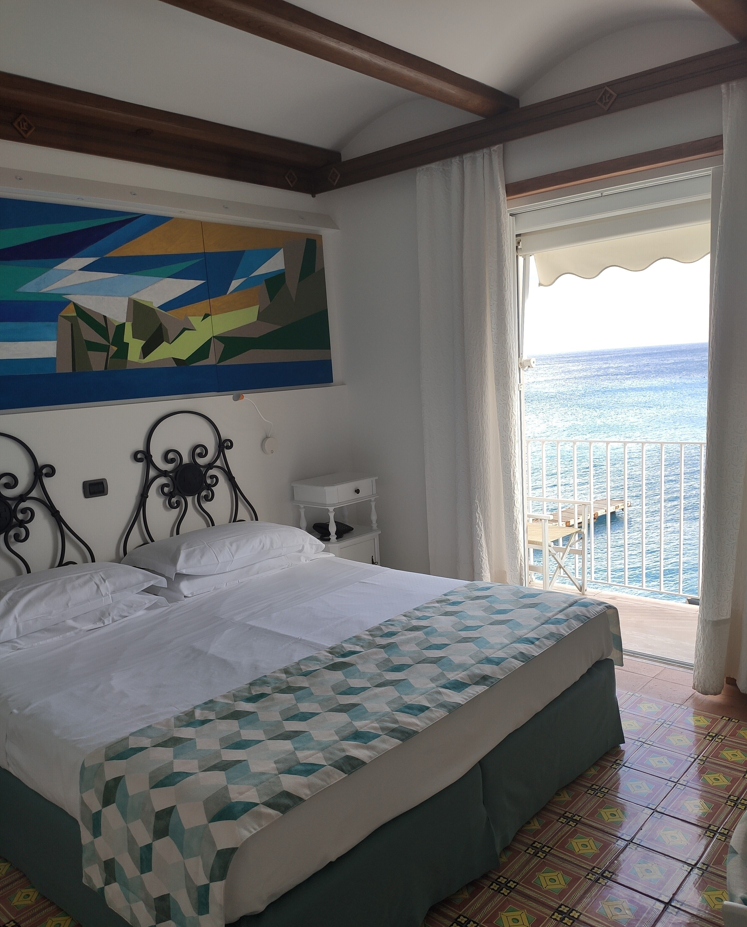 standard double room, sea view | 1 bedroom, minibar, in-room safe, desk