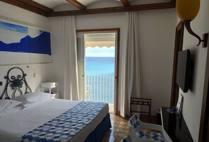 Standard Double Room, Sea View | Minibar, in-room safe, desk, blackout drapes