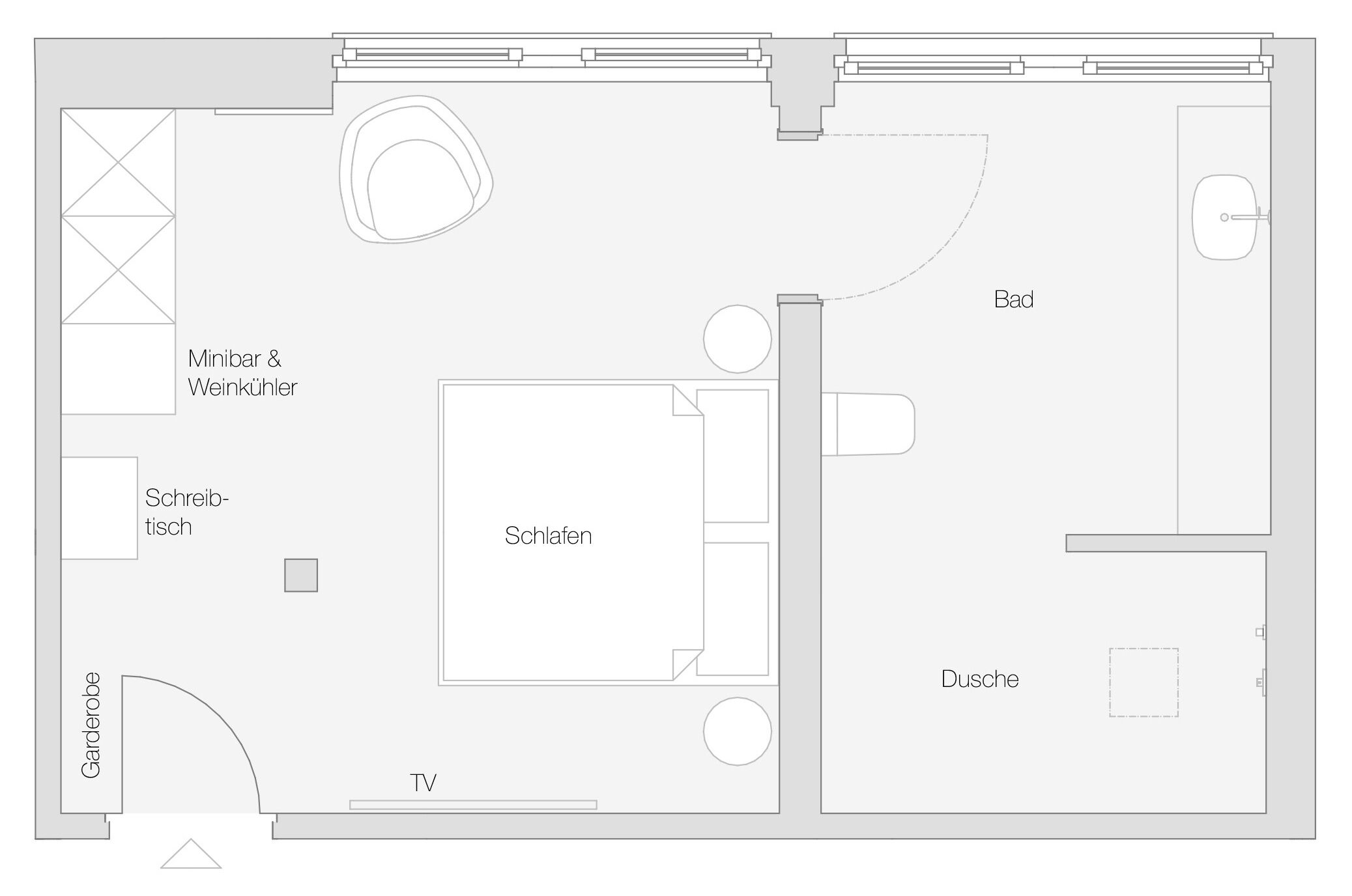 Indeling van een hotelkamer met een bed, televisie, badkamer en een zithoekje.