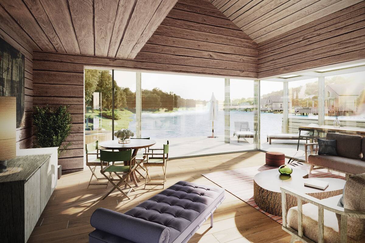 A modern interior with a wooden ceiling, a dining area with a table and chairs, a sofa, and a large window overlooking a body of water.