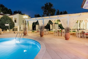 Outdoor pool, open 10:30 AM to 7:30 PM, pool umbrellas, pool loungers