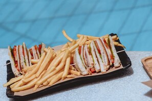 A tray with sandwiches and fries. - Iphigenia Mythic Retreat (Hersonissos)