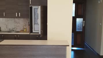 Classic Apartment, 2 Bedrooms, Kitchenette, City View | Living area | Flat-screen TV