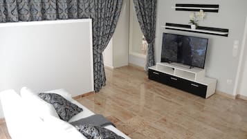 Apartemen, 1 Tempat Tidur King dengan tempat tidur Sofa, Bebas Asap Rokok (Apartment 2) | Area keluarga | TV layar datar