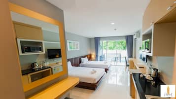 Habitación Deluxe con 2 camas individuales, acceso a la alberca | Escritorio, insonorización, camas extra y wifi gratis