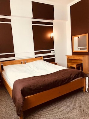 Deluxe Room | Blackout drapes, iron/ironing board, free WiFi, bed sheets