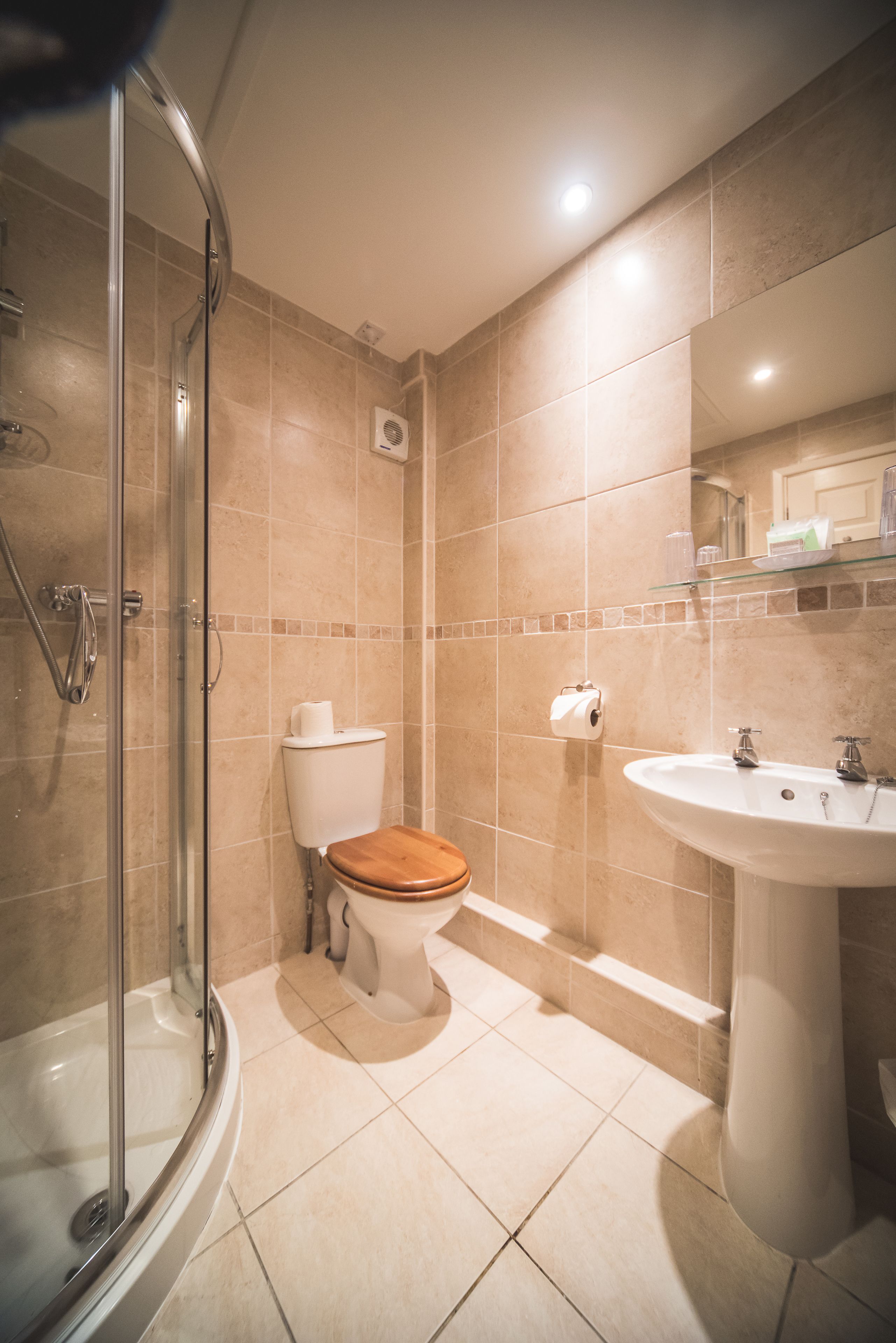 double room with extra bed (2 adults + 1 child) | bathroom | combined shower/bathtub, hair dryer, towels