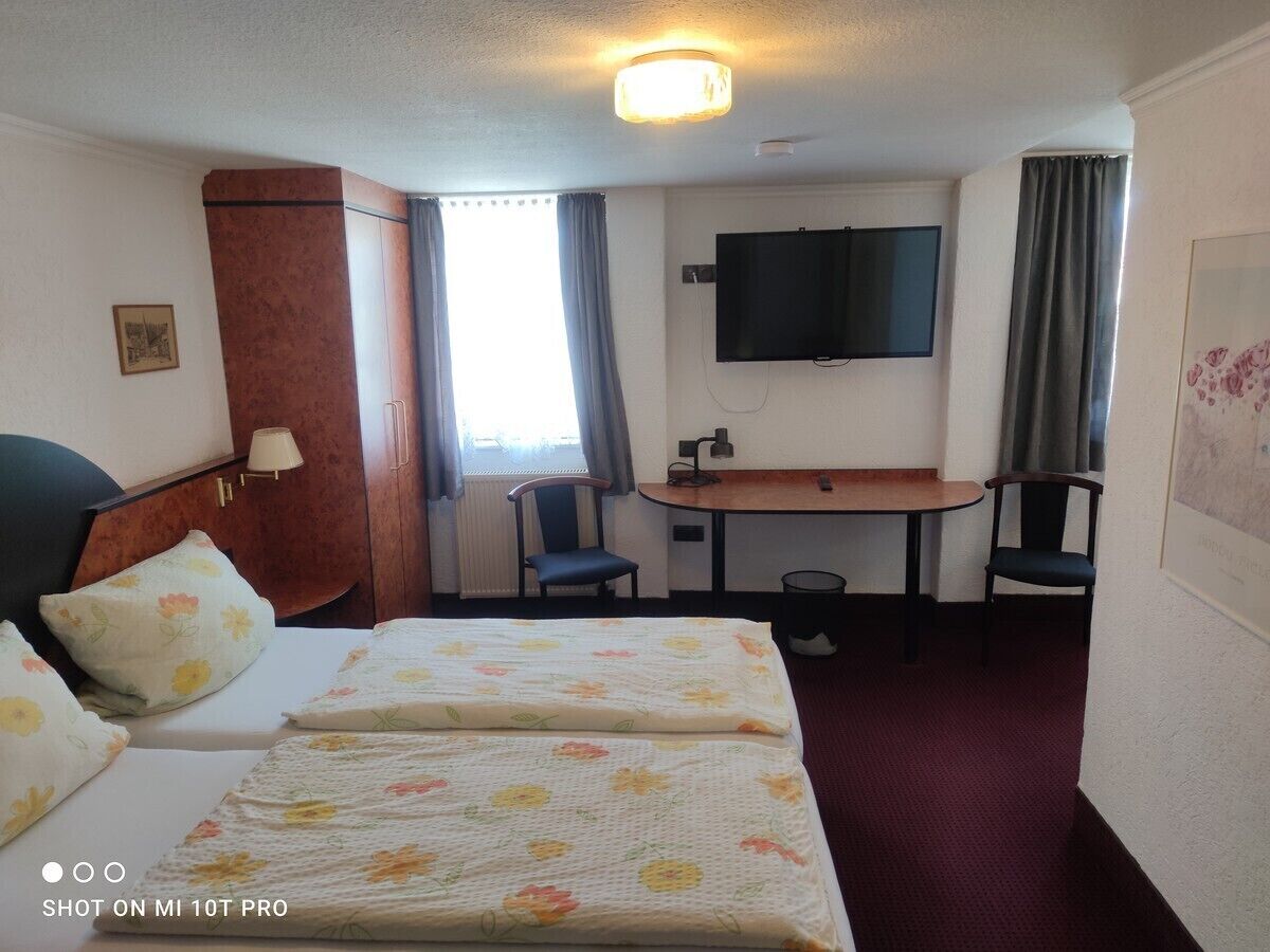 Standard Triple Room, Private Bathroom, City View | In-room safe, desk, soundproofing, free WiFi