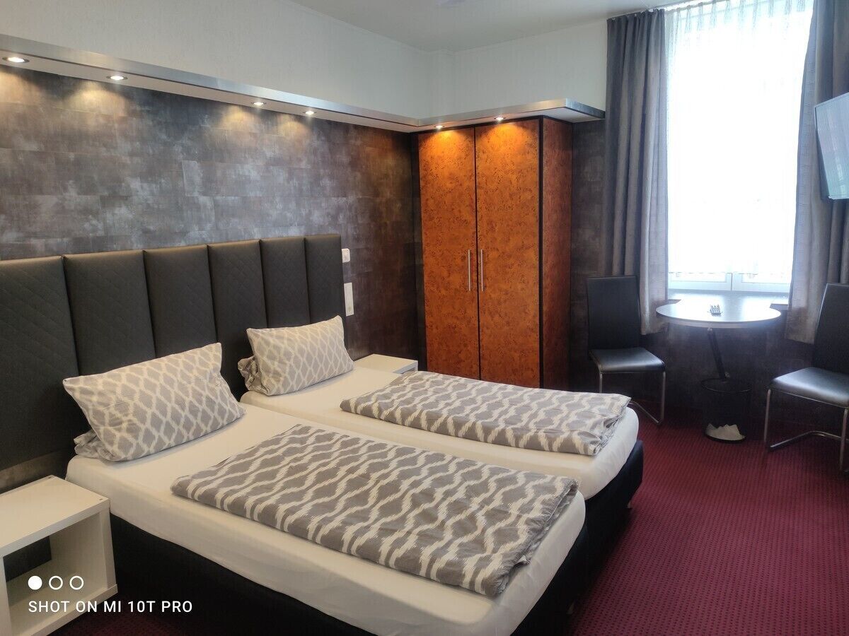 Superior-Doppelzimmer, eigenes Bad, Stadtblick | Zimmerausstattung