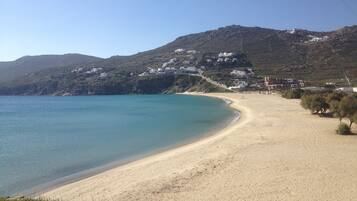 Plage, sable blanc, navette pour la plage, serviettes de plage