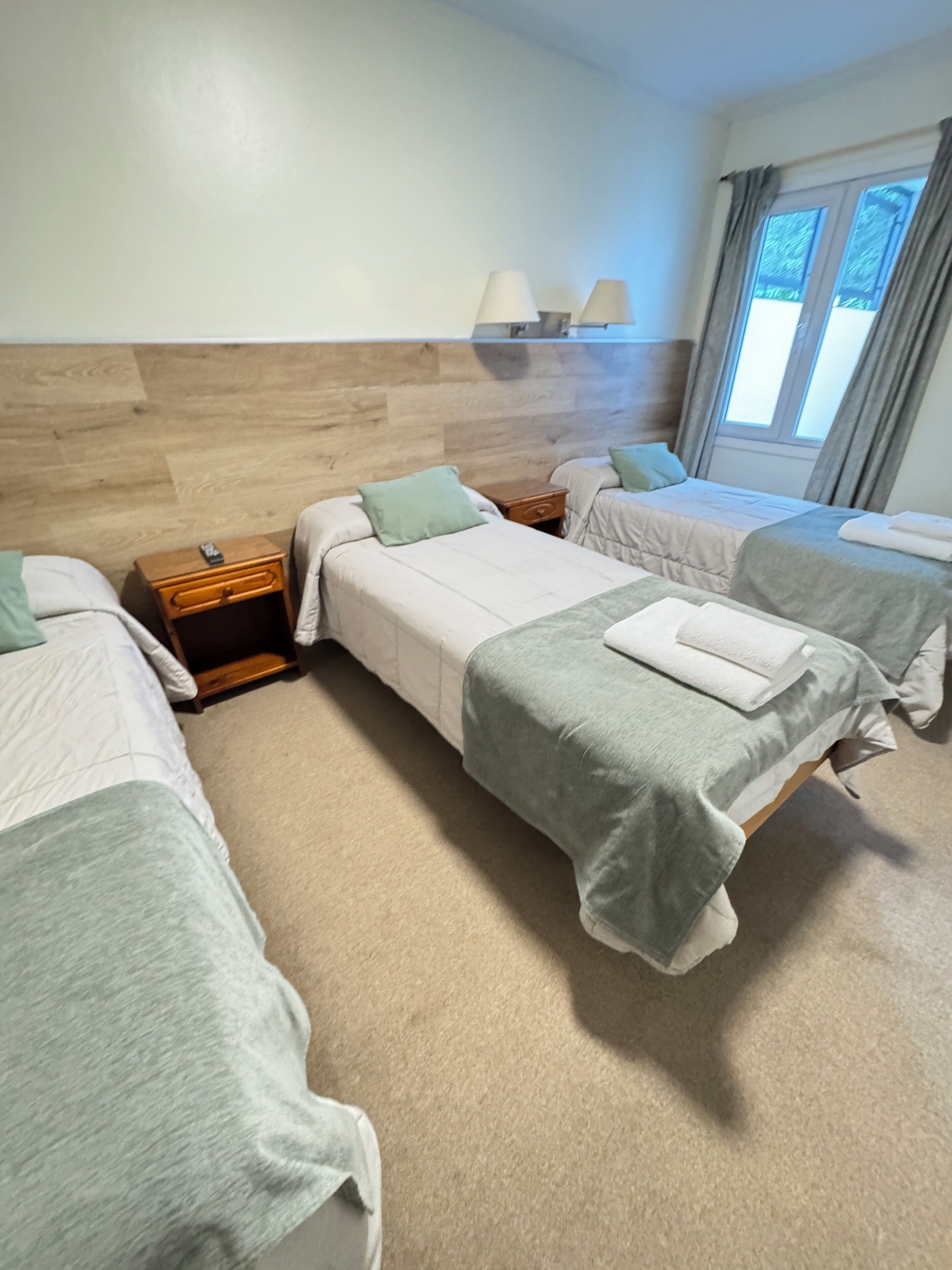 Hab. Triple Twin | Down comforters, blackout drapes, free WiFi, bed sheets