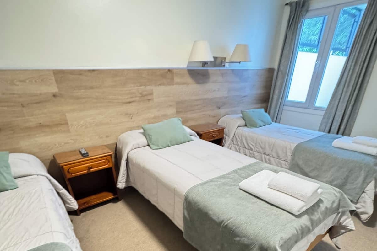 Hab. Triple Twin | Down comforters, blackout drapes, free WiFi, bed sheets