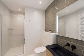 Bathtub, hair dryer, towels