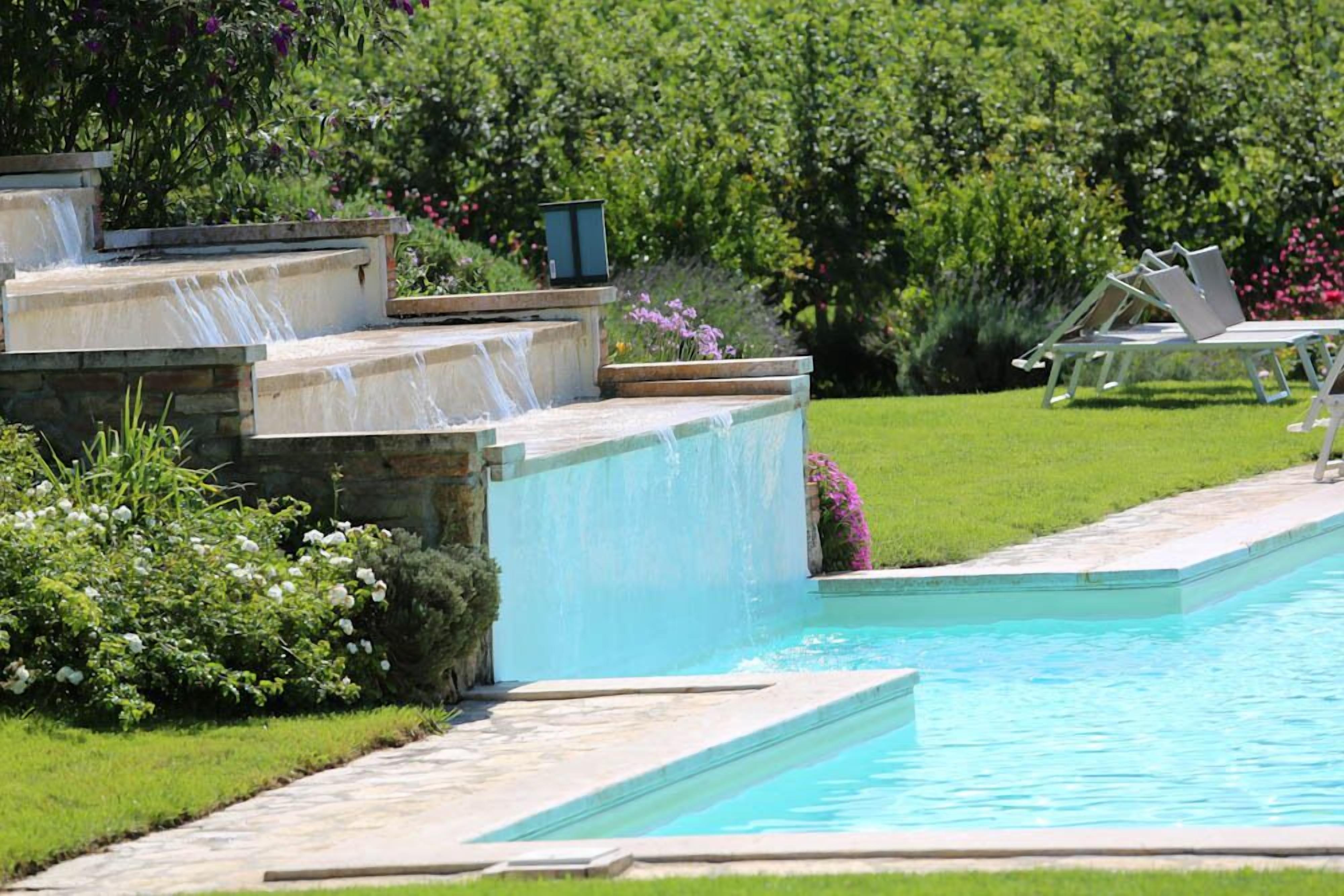 Seasonal outdoor pool, pool umbrellas, pool loungers