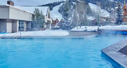 Ski-in/ski-out condo with mountain views, hot tub, pool & gym access