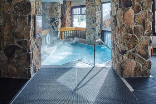 Ski-in/ski-out condo with mountain views, hot tub, pool & gym access