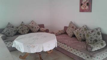 Duplex, 3 Bedrooms | Living area | Plasma TV