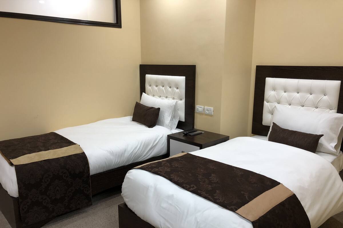 Deluxe Quadruple Room, Multiple Beds, Non Smoking | 3 bedrooms, minibar (free items), in-room safe, desk
