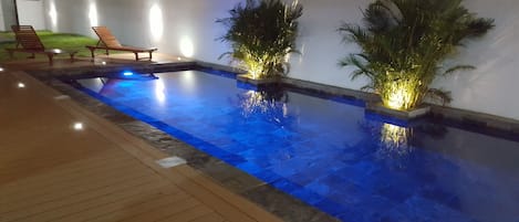 Outdoor pool, open 6 AM to 10 PM, sun loungers