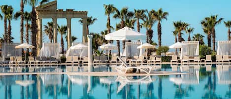 Indoor pool, 2 outdoor pools, open 7 AM to 8 PM, pool umbrellas