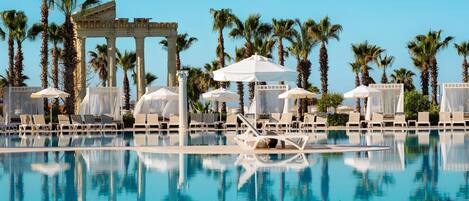 Indoor pool, 2 outdoor pools, open 7 AM to 8 PM, pool umbrellas