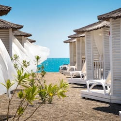 On the beach, sun loungers, beach umbrellas, beach towels